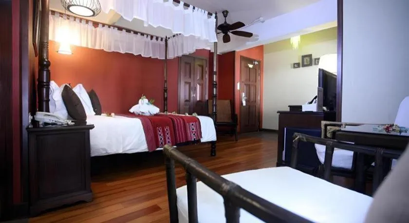 Bed in Anggun Boutique Hotel