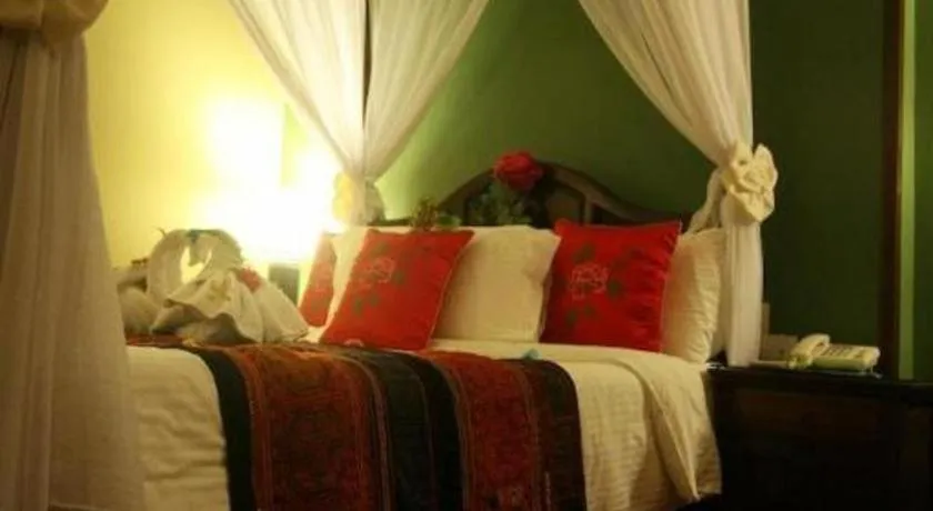 Bed in Anggun Boutique Hotel