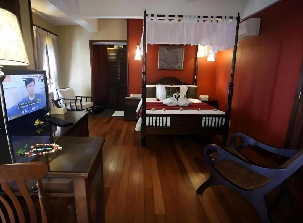 Bed in Anggun Boutique Hotel