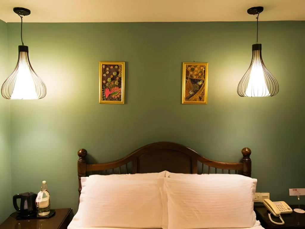 Bed in Anggun Boutique Hotel