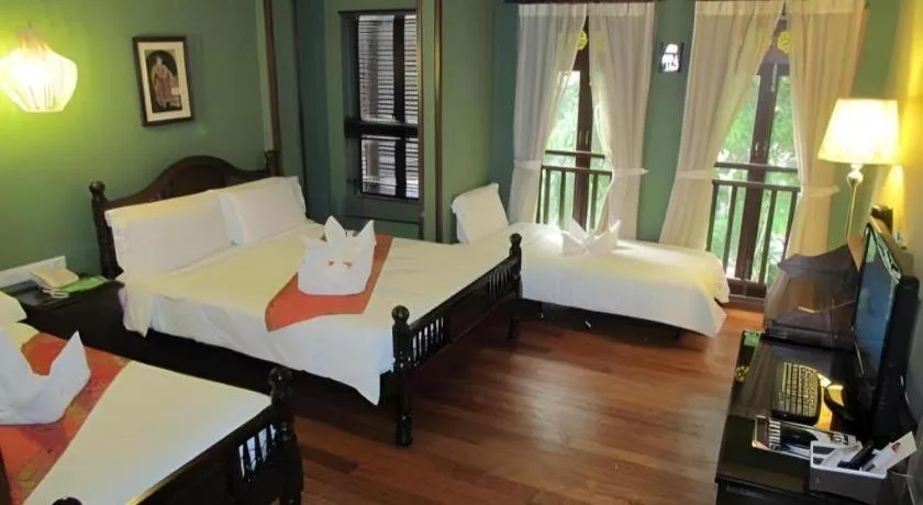 Bed in Anggun Boutique Hotel