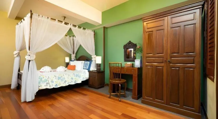 Bed in Anggun Boutique Hotel