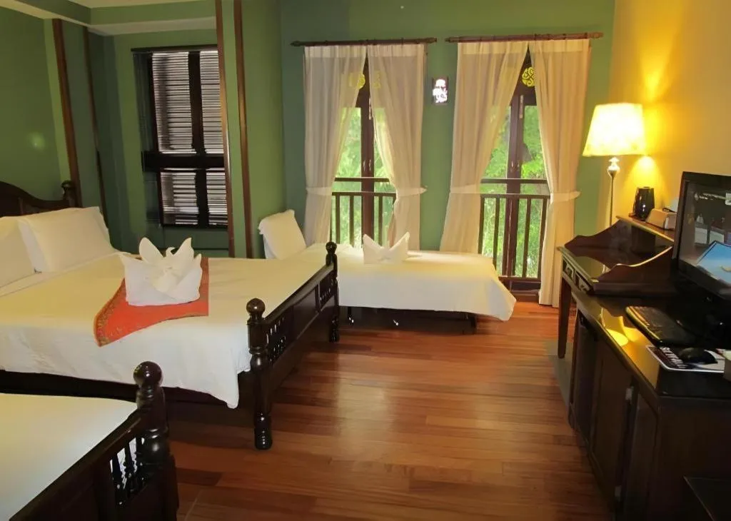 Bed in Anggun Boutique Hotel