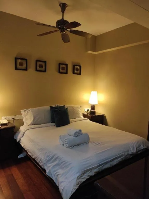 Bed in Anggun Boutique Hotel