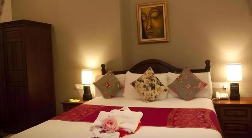 Bed in Anggun Boutique Hotel