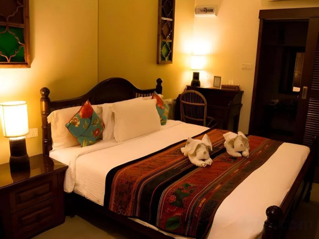 Bed in Anggun Boutique Hotel