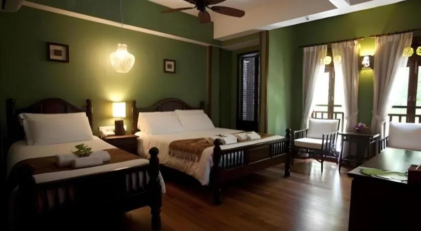 Bed in Anggun Boutique Hotel