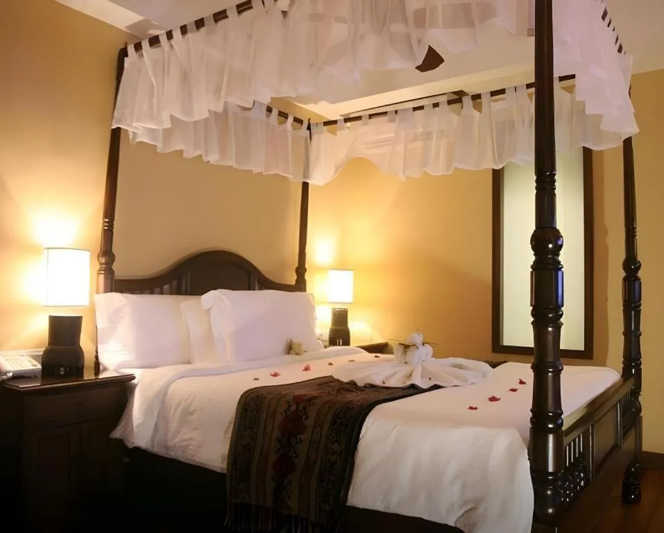Bed in Anggun Boutique Hotel