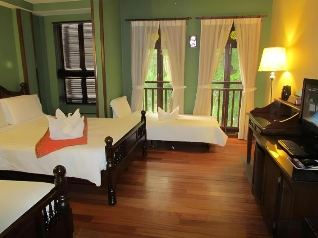 Bed in Anggun Boutique Hotel