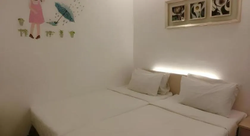Bed in Paragon City Hotel