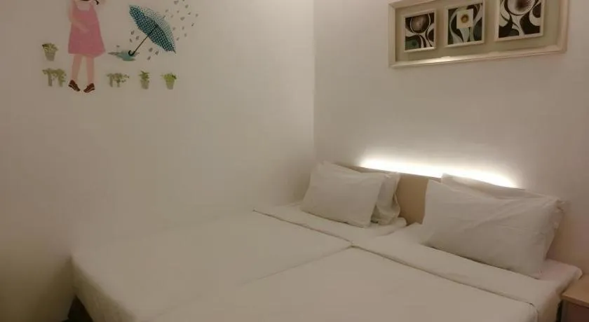Bed in Paragon City Hotel