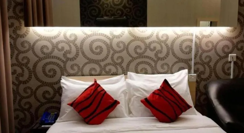 Bed in Paragon City Hotel