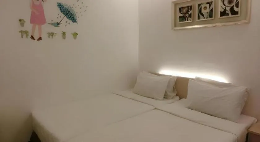 Bed in Paragon City Hotel