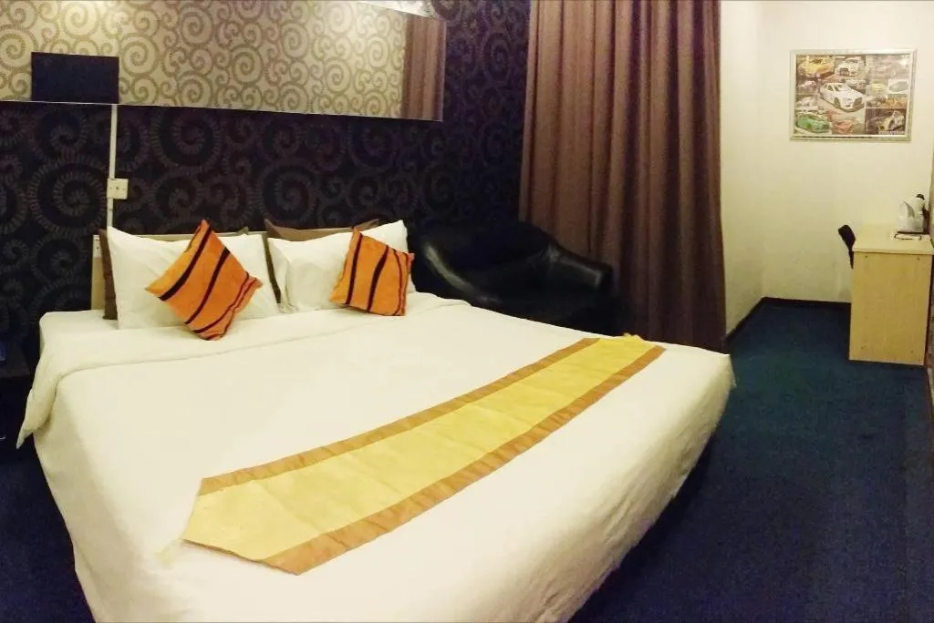 Bed in Paragon City Hotel
