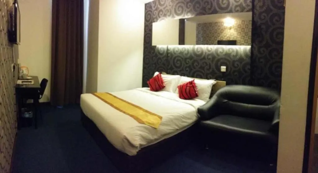 Bed in Paragon City Hotel