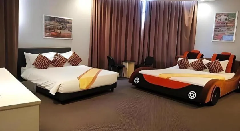 Bed in Paragon City Hotel