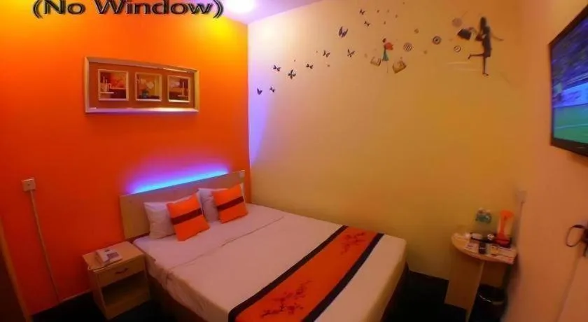 Bed in Paragon City Hotel