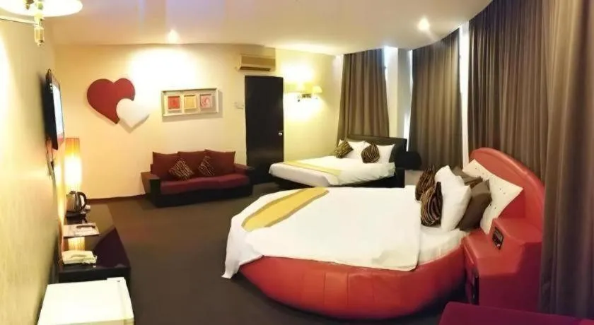 Bed in Paragon City Hotel