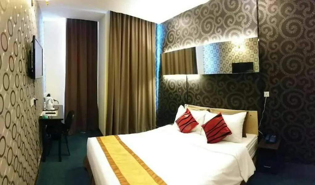 Bed in Paragon City Hotel