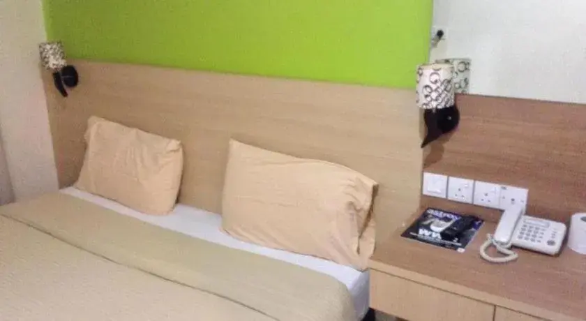 Bed in Maxim Hotel Kota Kinabalu Bed in Maxim Hotel Kota Kinabalu