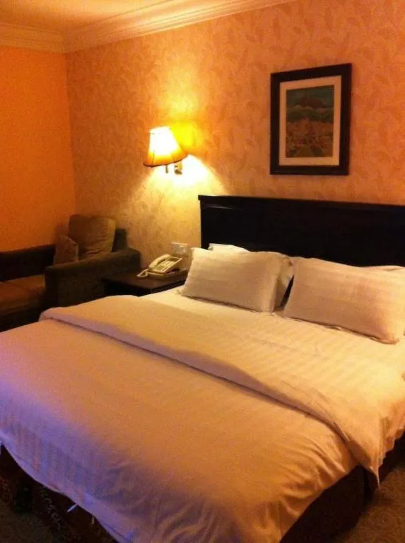 Bed in D'Borneo Hotel