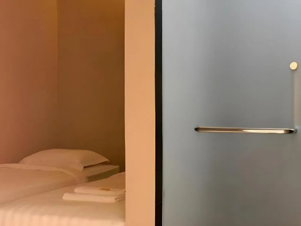 Bed in D'Borneo Hotel