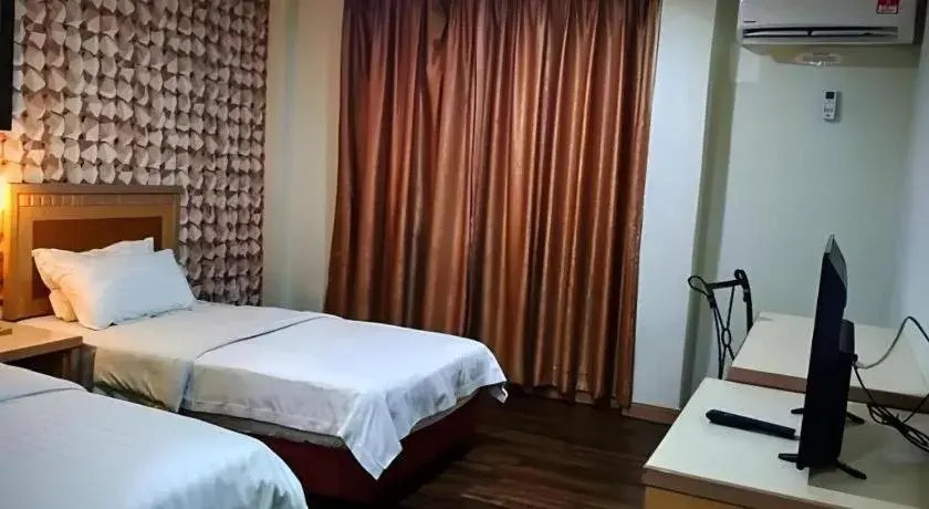 Bed in D'Borneo Hotel Bed in D'Borneo Hotel