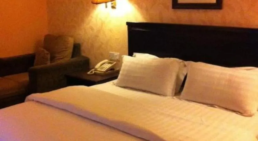 Bed in D'Borneo Hotel