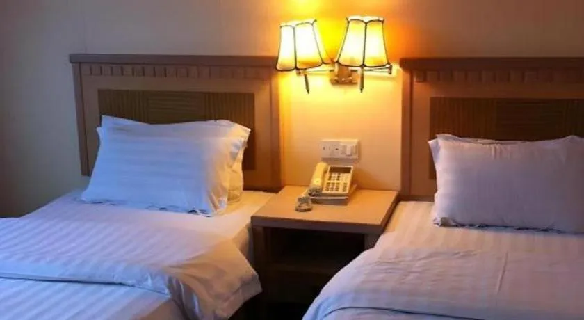 Bed in D'Borneo Hotel