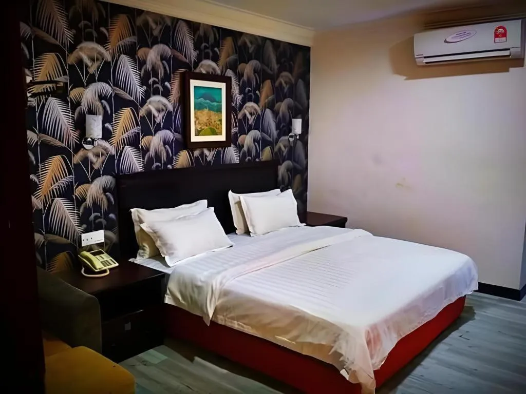 Bed in D'Borneo Hotel