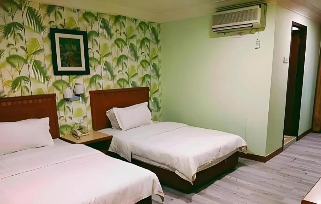 Bed in D'Borneo Hotel