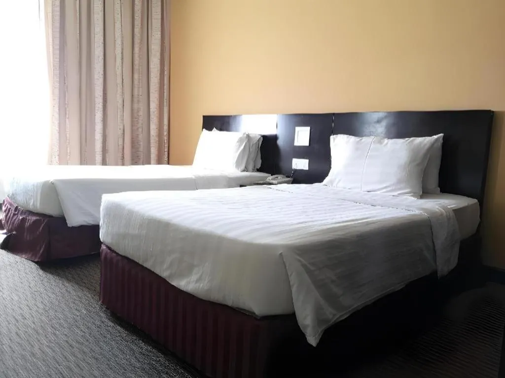 Bed in Perkasa Hotel Keningau