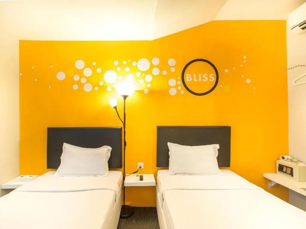 Bed in Bliss Boutique Hotel