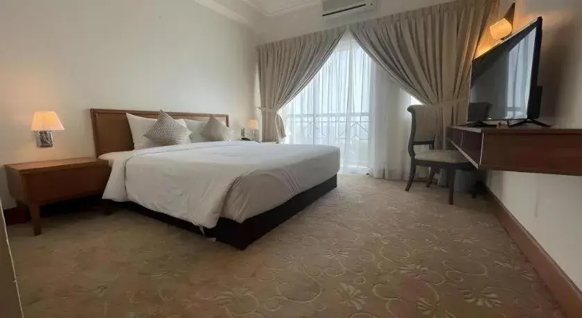 Bed in Putra Brasmana Hotel Bed in Putra Brasmana Hotel