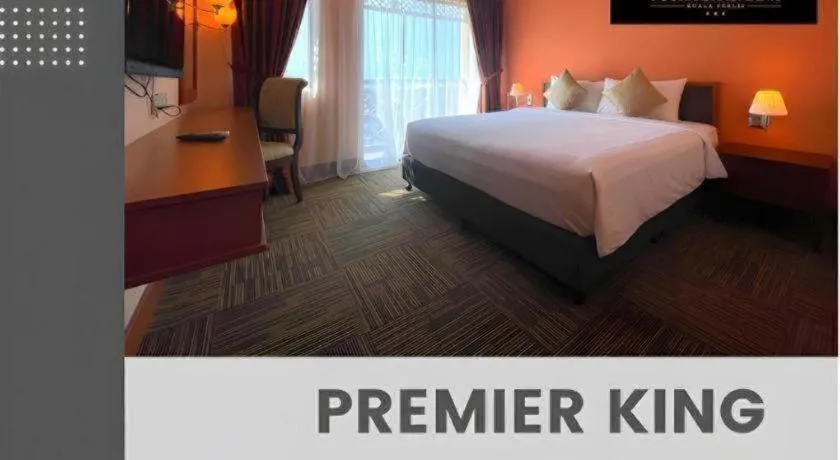 Bed in Putra Brasmana Hotel