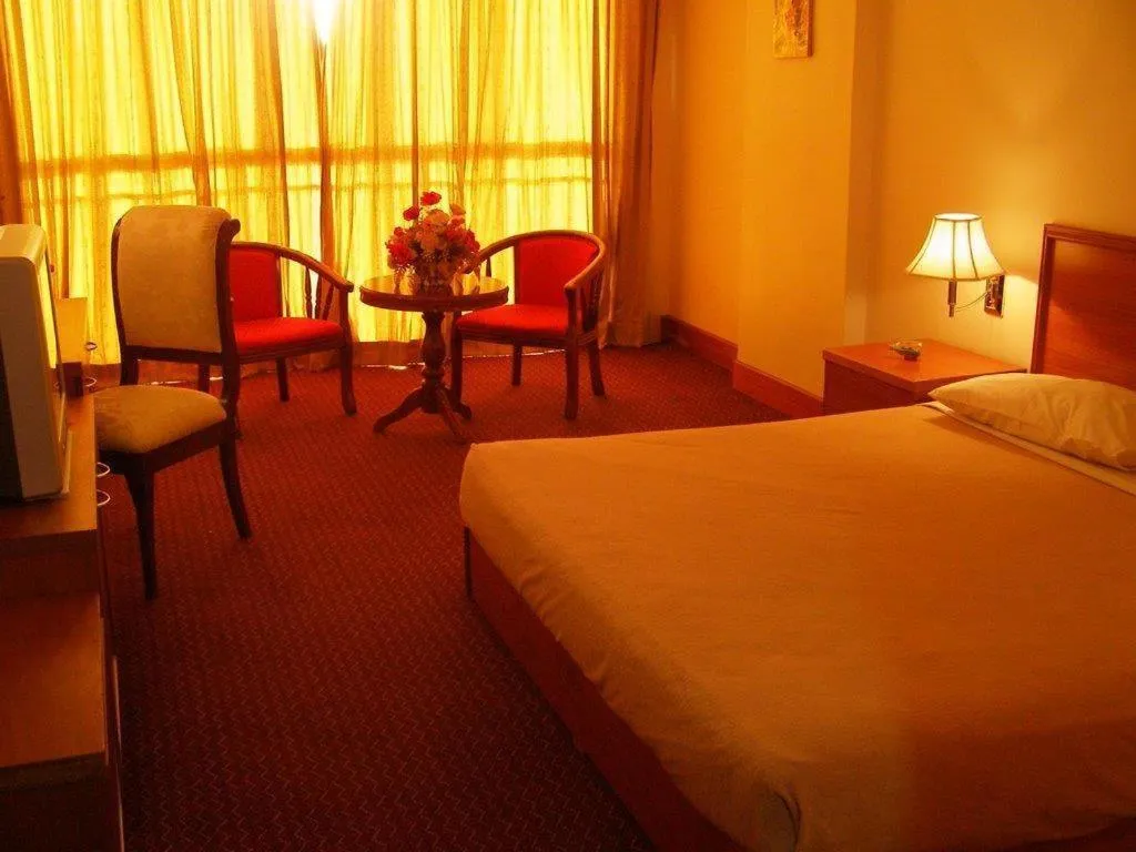 Bed in Putra Brasmana Hotel