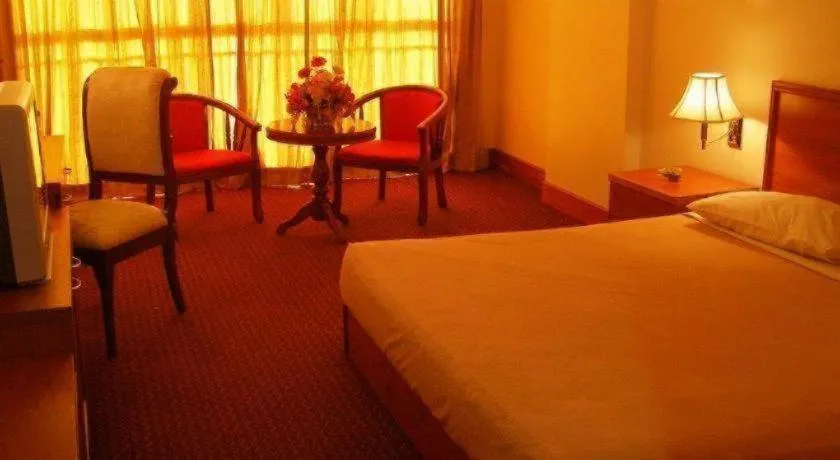 Bed in Putra Brasmana Hotel