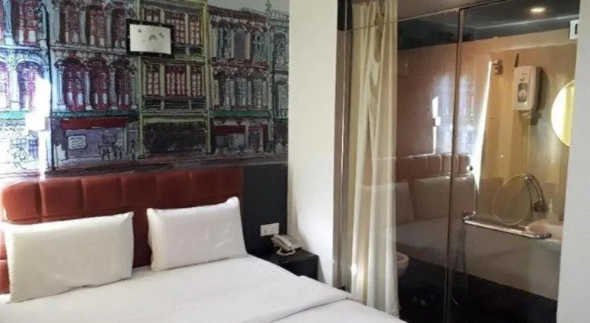 Bed in OYO 90865 Hotel De Nice Inn