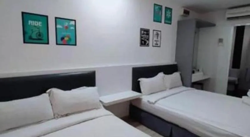 Bed in Hotel Zamburger Plaza Mahkota