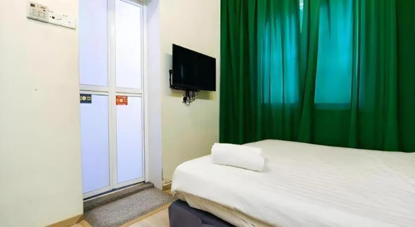 Bed in Hotel Zamburger Plaza Mahkota