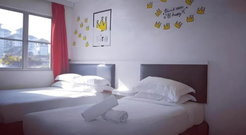 Bed in Hotel Zamburger Plaza Mahkota