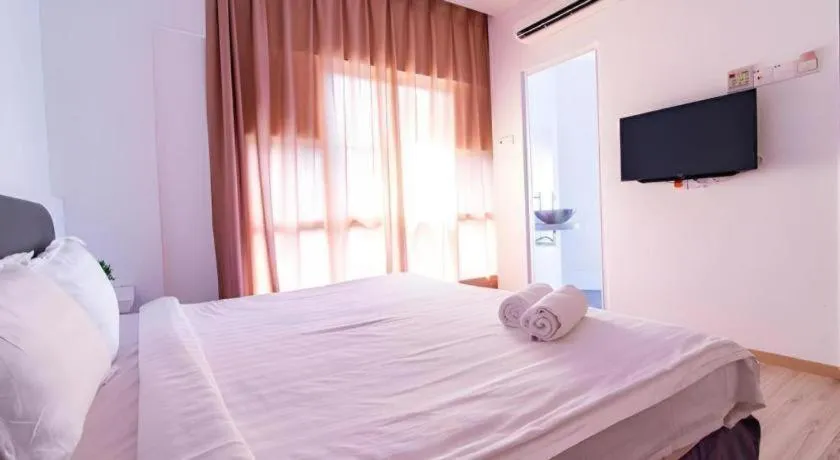 Bed in Hotel Zamburger Plaza Mahkota