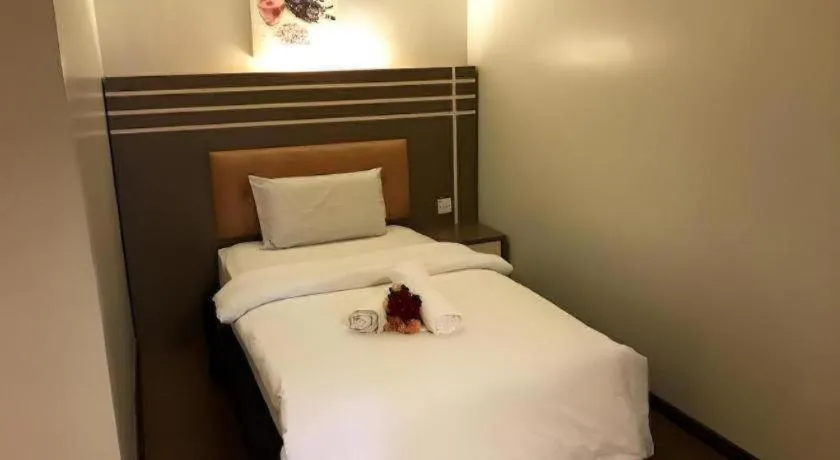 Bed in The Landmark Hotel