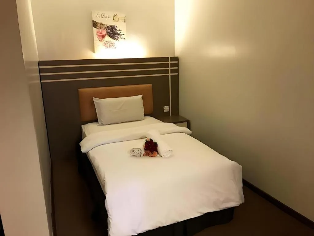 Bed in The Landmark Hotel