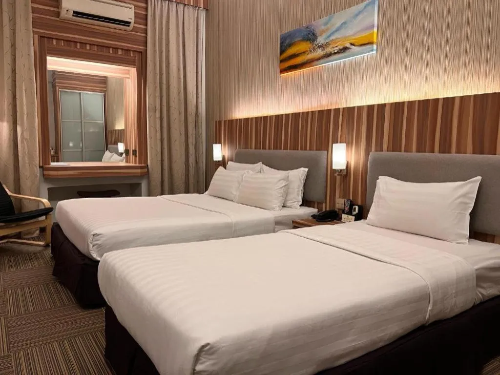 Bed in The Landmark Hotel