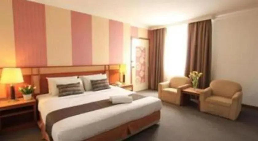 Bed in Pelican Hotel Bed in Pelican Hotel