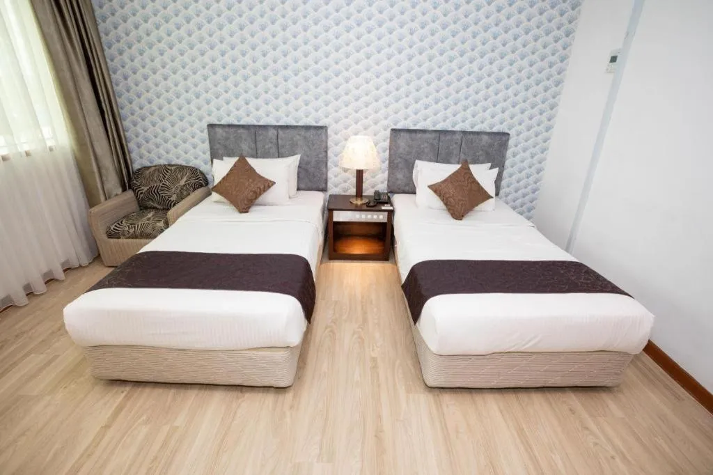 Bed in Pelican Hotel