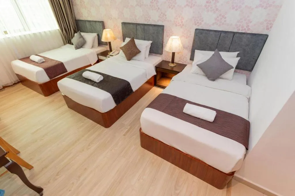 Bed in Pelican Hotel