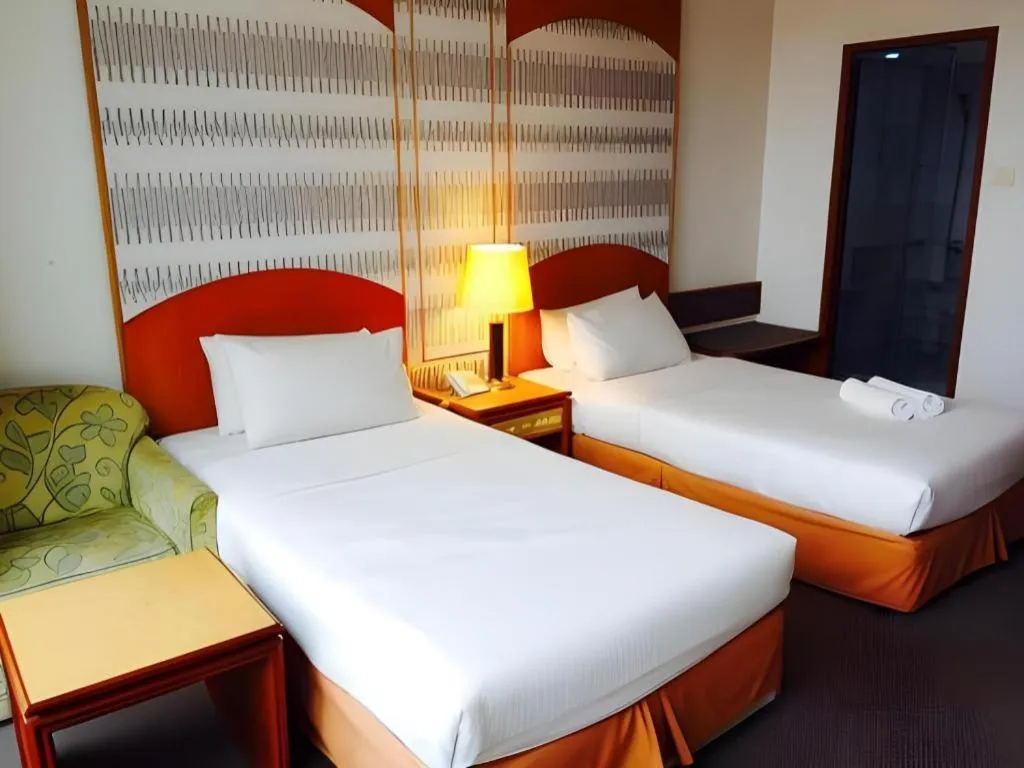 Bed in Pelican Hotel