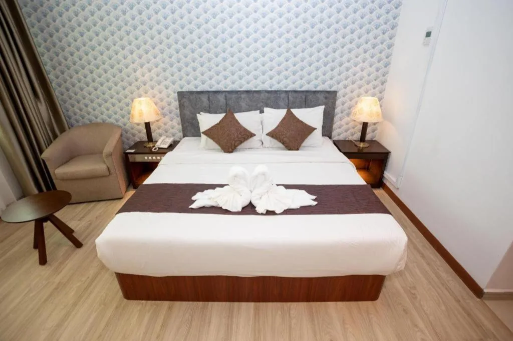 Bed in Pelican Hotel